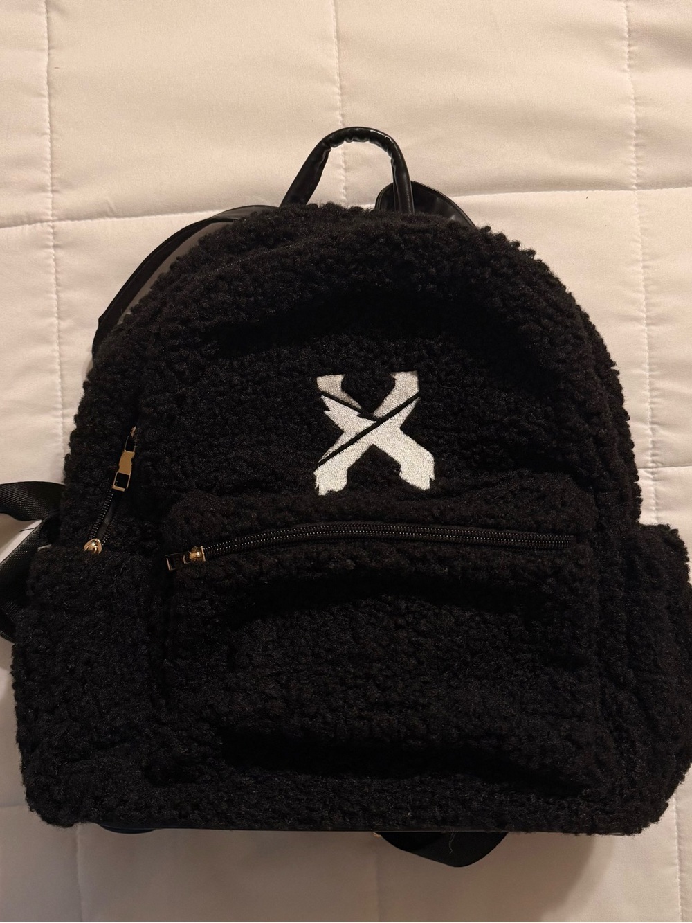 Excision fuzzy backpack